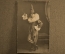 Фотография молодой женщины в костюме клоуна (паяц, арлекин). Царская Россия.