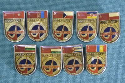 Серия, набор значков "Интеркосмос" (9 штук). Болгария, Венгрия, ГДР, Польша и прочие участники. СССР