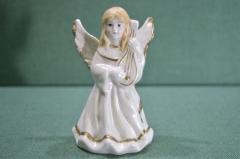 Фигурка, статуэтка "Девочка ангелок с лютней". Фарфор. Европа.