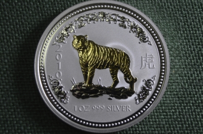 Монета 1 доллар "Золотой тигр 2010". Елизавета II. Серебро, унцовка. Коробка. Австралия, 2007 год.