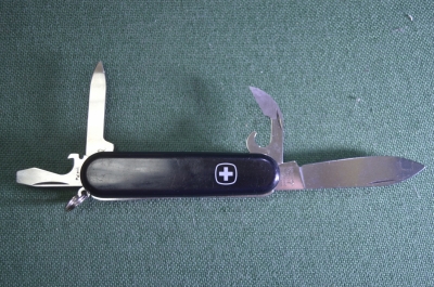 Нож раскладной перочинный офицерский "Wenger Венгер". 4 предмета. Винтаж. Швейцария.