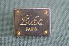 Знак, значок "Luba Paris". Люба, магазин женской одежды, пальто, плащи. Тяжелый металл. Франция.