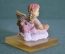 Статуэтка фигурка "Ангел с цветами ангелочек". Композитный материал.