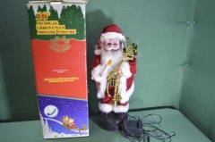Дед Мороз под елку. Интерактивная игрушка с подсветкой. Коробка. Китай. 1990-е годы.