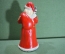 Новогодний сувенир, Дед Мороз в красном халате. Пластик. Высота 20 см.