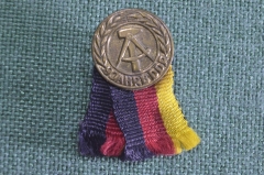 Знак значок с лентой "9 лет ГДР". Германия.
