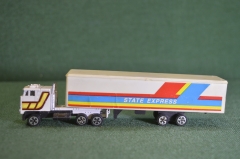 Модель масштабная, грузовик тягач с прицепом "State Express", фура. Клейм нет.