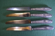 Ножи старинные столовые, набор (4 шт) Серебро (?). Лезвия Paris. Клеймо женская голова. Длина 25 см.