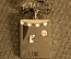 Значок "PUK". Латунь, эмаль. Япония. 1970-е годы