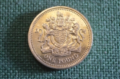 Монета 1 фунт 2003 год. One pound. Королевский герб. Елизавета II, Великобритания.