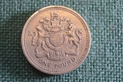 Монета 1 фунт 1983 год. One pound. Королевский герб. Елизавета II, Великобритания.