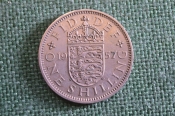 Монета 1 шиллинг 1957 год. Shilling. Елизавета II, Великобритания.