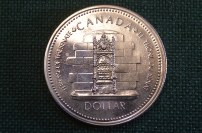 Монета 1 доллар 1977 год. Серебряный юбилей, Трон Сената. Серебро. Елизавета II. Canada, Канада.