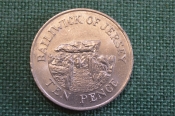 Монета 10 пенсов 1986 года. Ten Pence. Дольмены Ла-Пукелай-де-Фальдуэ. Джерси, Bailiwick of Jersey. 