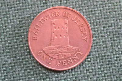Монета 1 пенни 1987 года. One penny. Башня в Ле-Хок. Джерси, Bailiwick of Jersey. Елизавета II.