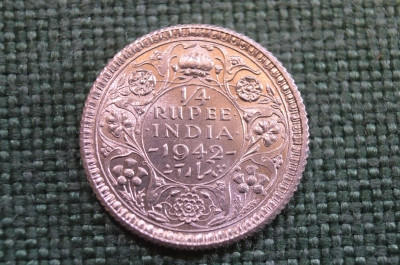 Монета 1/4 рупии 1942 года. Quarter rupee. Серебро. Британская Индия, India. Георг VI.