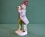Статуэтка, фигурка фарфоровая "Уличный музыкант с флейтой". Фарфор. Германия. Дефект.
