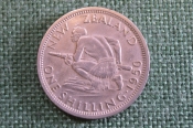 Монета 1 шиллинг 1950 года. One Shilling. Туземец с копьем. Георг VI. New Zealand. Новая Зеландия. Монета 1 шиллинг 1950 года. One Shilling. Туземец с копьем. Георг VI. New Zealand. Новая Зеландия.
