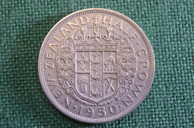 Монета 1/2 кроны 1950 года. Half Crown. Георг VI. Герб. New Zealand. Новая Зеландия.