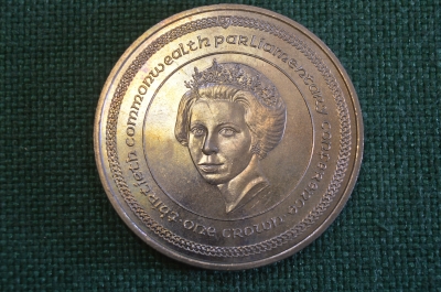 Монета 1 крона 1984 года. One Crown. Конференция Содружества. Елизавета II. Isle of Man. Остров Мэн.